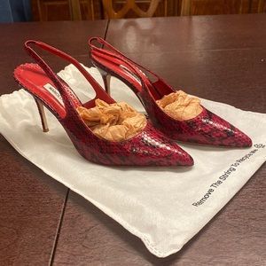 Manolo Blahnik black and red snake print sling back pumps.